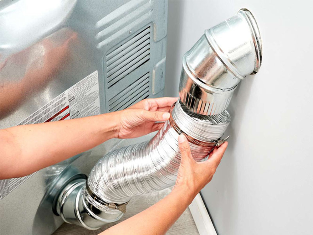 may say quan ao bi chay nuoc 4 Sai vật liệu làm ống thông hơi khiến máy sấy quần áo bị chảy nước